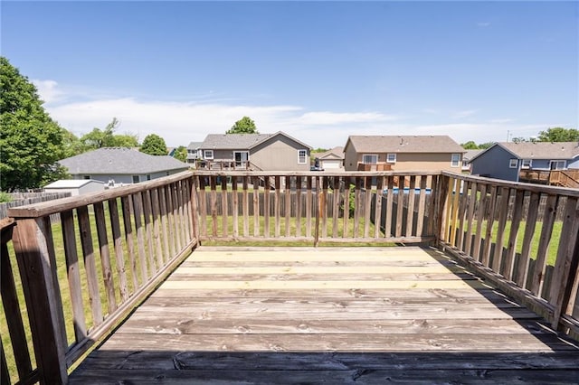 706 E 15th St E, Eudora, KS 66025 - wooden terrace featuring a residential view