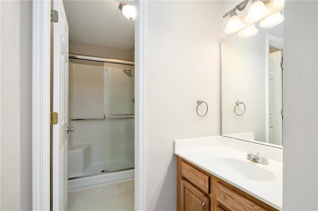 706 E 15th St E, Eudora, KS 66025 - bathroom featuring a stall shower and vanity