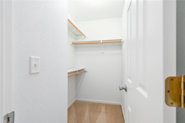 706 E 15th St E, Eudora, KS 66025 - walk in closet featuring carpet floors