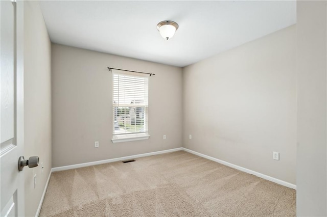 706 E 15th St E, Eudora, KS 66025 - carpeted spare room with baseboards