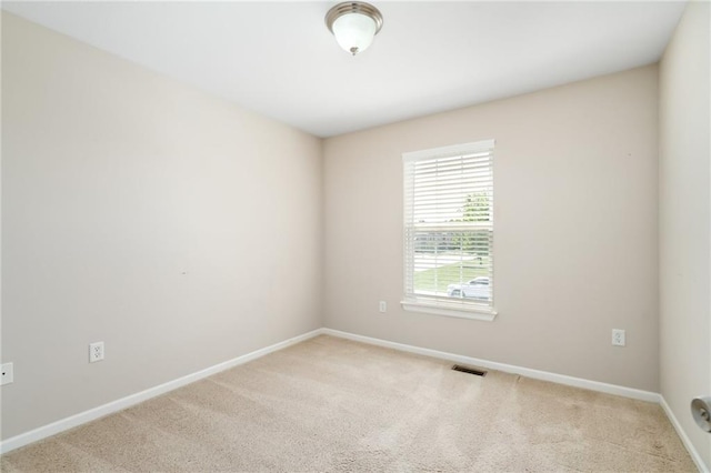 706 E 15th St E, Eudora, KS 66025 - spare room with light carpet and baseboards