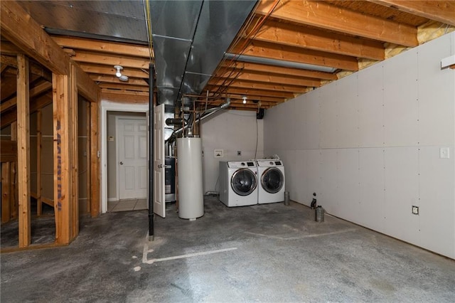 706 E 15th St E, Eudora, KS 66025 - unfinished below grade area featuring washing machine and clothes dryer and water heater