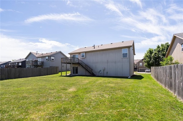 706 E 15th St E, Eudora, KS 66025 - rear view of house featuring stairs, a wooden deck, and a residential view
