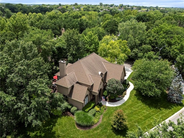 15141 Windsor Cir, Leawood, KS 66224 - aerial view of property and surrounding area with a heavily wooded area