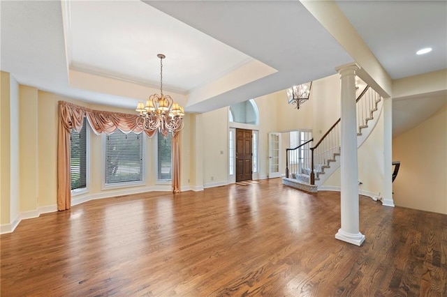 15141 Windsor Cir, Leawood, KS 66224 - foyer with a chandelier, stairway, wood finished floors, a tray ceiling, and recessed lighting