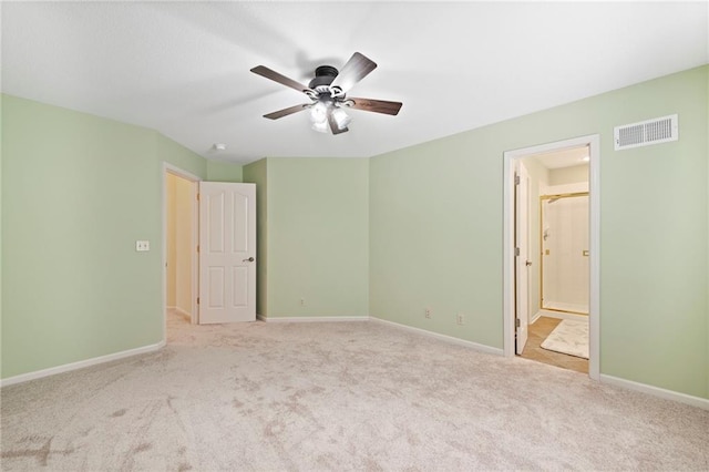 15141 Windsor Cir, Leawood, KS 66224 - unfurnished bedroom with carpet flooring, ensuite bath, and a ceiling fan
