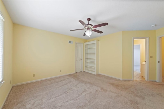 15141 Windsor Cir, Leawood, KS 66224 - unfurnished bedroom with light carpet and ceiling fan