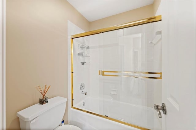15141 Windsor Cir, Leawood, KS 66224 - bathroom with toilet and bath / shower combo with glass door