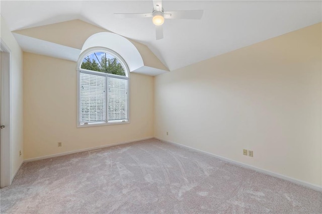 15141 Windsor Cir, Leawood, KS 66224 - empty room with carpet flooring, lofted ceiling, and ceiling fan