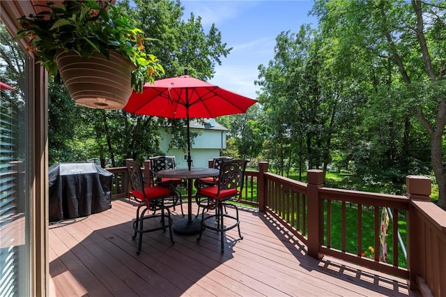 15141 Windsor Cir, Leawood, KS 66224 - wooden deck with outdoor dining space and area for grilling