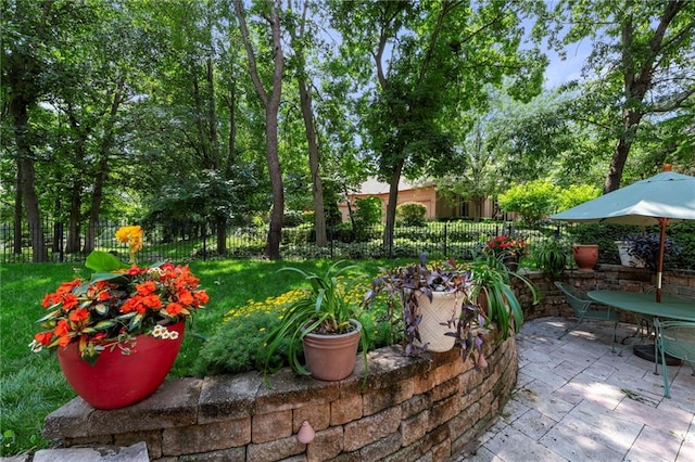 15141 Windsor Cir, Leawood, KS 66224 - fenced backyard with a patio area