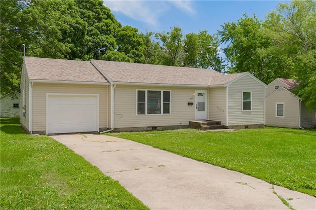 707 N Delaware St, Butler, MO 64730 - ranch-style home with a garage, concrete driveway, crawl space, a front yard, and roof with shingles