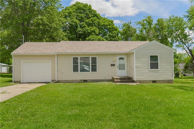 707 N Delaware St, Butler, MO 64730 - ranch-style house featuring a garage, crawl space, driveway, and a front lawn