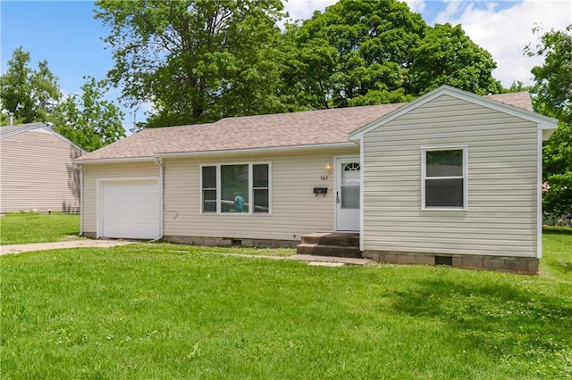 707 N Delaware St, Butler, MO 64730 - single story home with crawl space, concrete driveway, an attached garage, a front yard, and a shingled roof