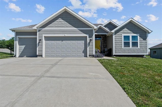 12930 N Champanel Way, Platte City, MO 64079 - view of front of property with a garage, driveway, and a front lawn
