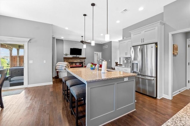 12930 N Champanel Way, Platte City, MO 64079 - kitchen featuring stainless steel fridge, ceiling fan, dark wood-style flooring, a sink, and recessed lighting