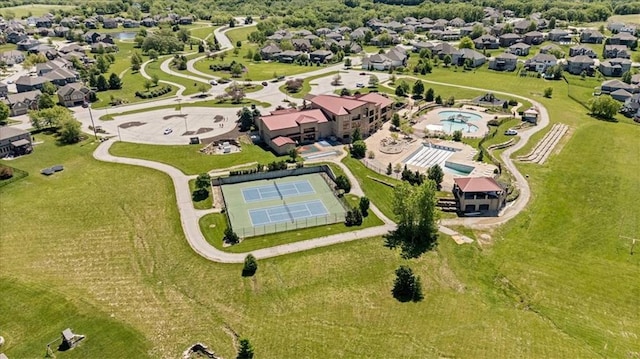 12930 N Champanel Way, Platte City, MO 64079 - aerial view of property's location with a pool and nearby suburban area