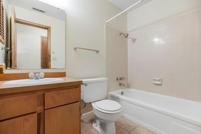 1339 Westbrooke St, Lawrence, KS 66049 - bathroom featuring toilet, tile patterned flooring, bathing tub / shower combination, and vanity