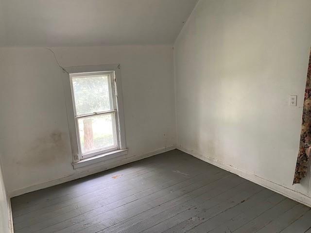 1209 S 6th St, Atchison, KS 66002 - spare room with hardwood / wood-style floors