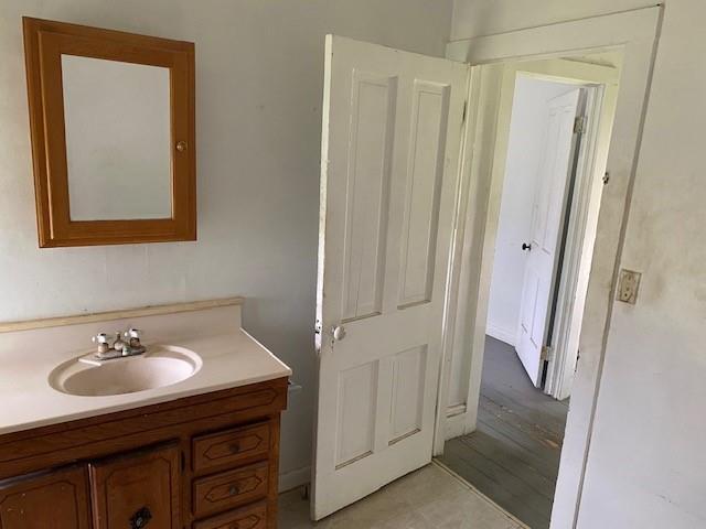 1209 S 6th St, Atchison, KS 66002 - bathroom with vanity