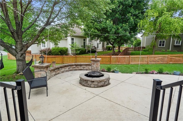 2705 W 137th Pl, Leawood, KS 66224 - view of patio featuring a fire pit