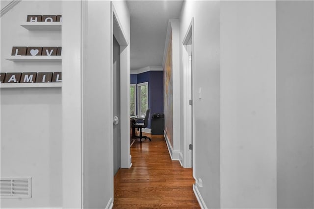 2705 W 137th Pl, Leawood, KS 66224 - corridor with dark wood-type flooring, an office area, ornamental molding, and baseboards