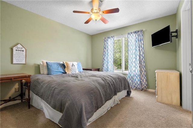 2705 W 137th Pl, Leawood, KS 66224 - bedroom with carpet, a textured ceiling, ceiling fan, and baseboards