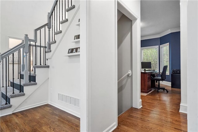 2705 W 137th Pl, Leawood, KS 66224 - stairs with wood finished floors, baseboards, and ornamental molding