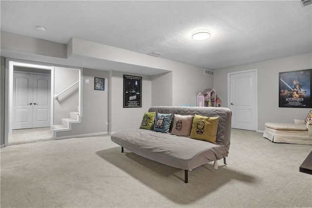 2705 W 137th Pl, Leawood, KS 66224 - carpeted living room with a textured ceiling, baseboards, and stairs