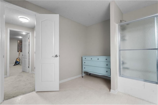 2705 W 137th Pl, Leawood, KS 66224 - bedroom with baseboards and a textured ceiling