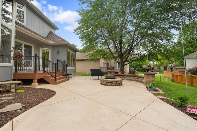 2705 W 137th Pl, Leawood, KS 66224 - view of patio / terrace with an outdoor fire pit