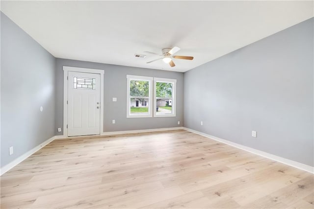 508 N Geronimo Dr, Independence, MO 64056 - entryway featuring ceiling fan, plenty of natural light, and light wood-style flooring