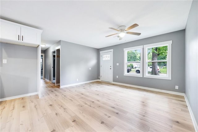 508 N Geronimo Dr, Independence, MO 64056 - empty room with ceiling fan, light wood-type flooring, and baseboards