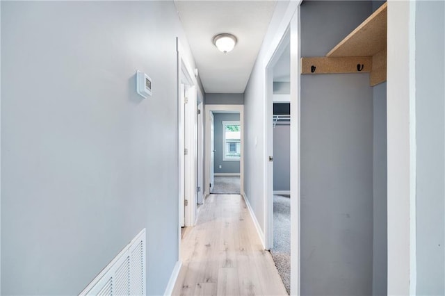 508 N Geronimo Dr, Independence, MO 64056 - corridor featuring baseboards and light wood-style flooring