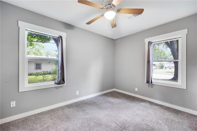 508 N Geronimo Dr, Independence, MO 64056 - carpeted spare room with plenty of natural light, baseboards, and ceiling fan