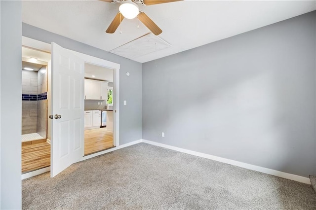 508 N Geronimo Dr, Independence, MO 64056 - carpeted empty room with attic access, ceiling fan, and baseboards