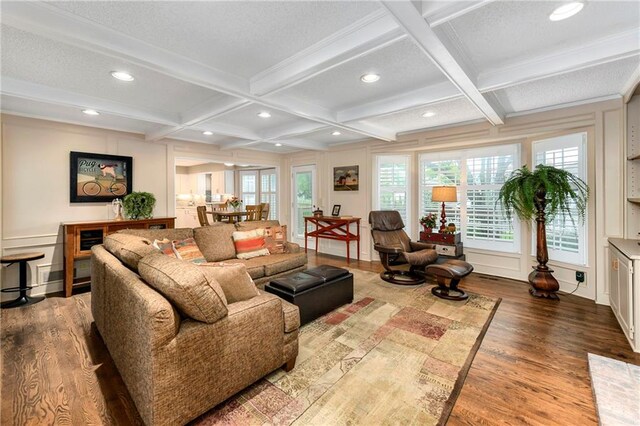 10500 Reeder St, Overland Park, KS 66214 - living room featuring wood finished floors, recessed lighting, coffered ceiling, and beamed ceiling
