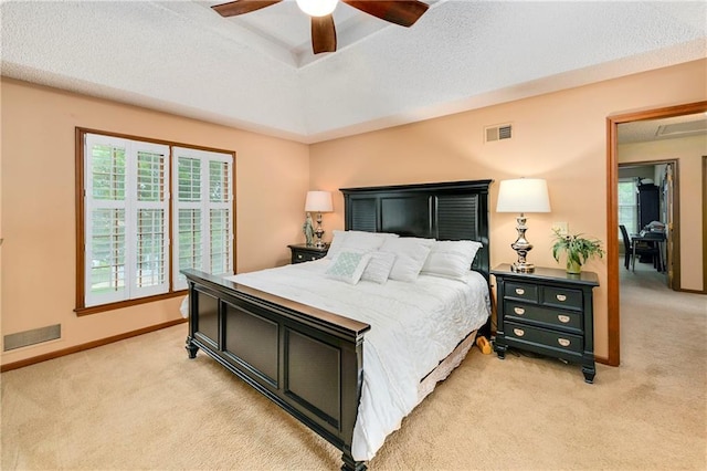 10500 Reeder St, Overland Park, KS 66214 - bedroom featuring light carpet, a raised ceiling, baseboards, and ceiling fan