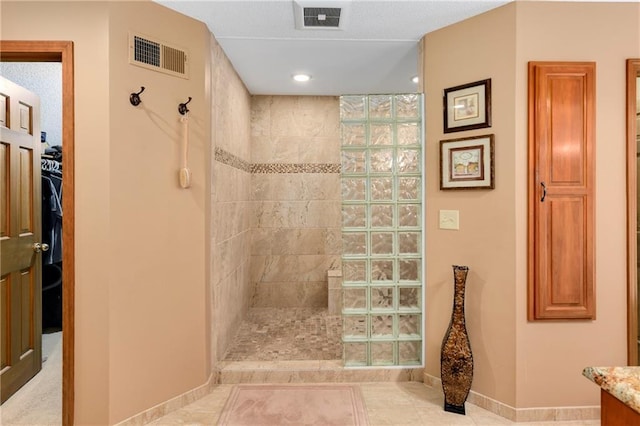 10500 Reeder St, Overland Park, KS 66214 - bathroom featuring a walk in shower, baseboards, vanity, recessed lighting, and tile patterned flooring