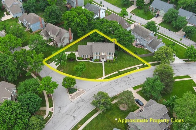 10500 Reeder St, Overland Park, KS 66214 - aerial view of residential area with property boundaries highlighted