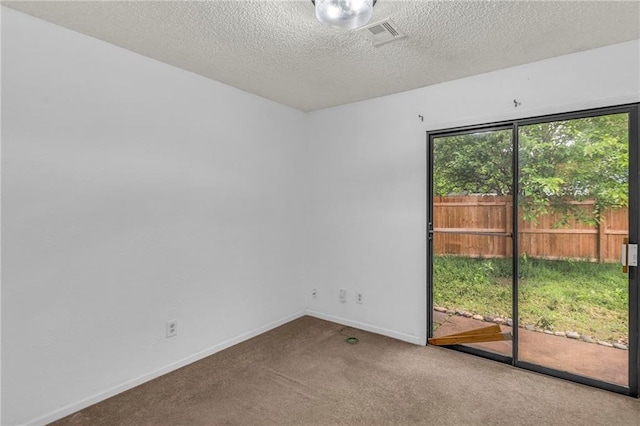 1528 E 123rd St, Olathe, KS 66061 - carpeted spare room with baseboards and a textured ceiling