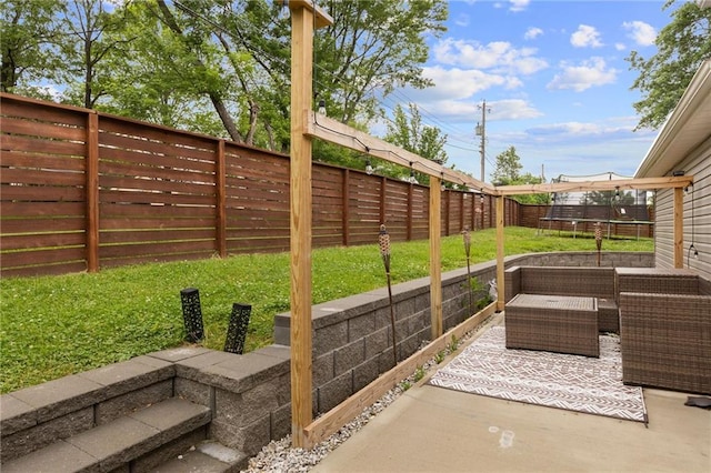 131 Cedar Ct, Warrensburg, MO 64093 - view of patio / terrace with a trampoline and an outdoor living space