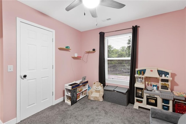 131 Cedar Ct, Warrensburg, MO 64093 - playroom with carpet, a ceiling fan, and baseboards
