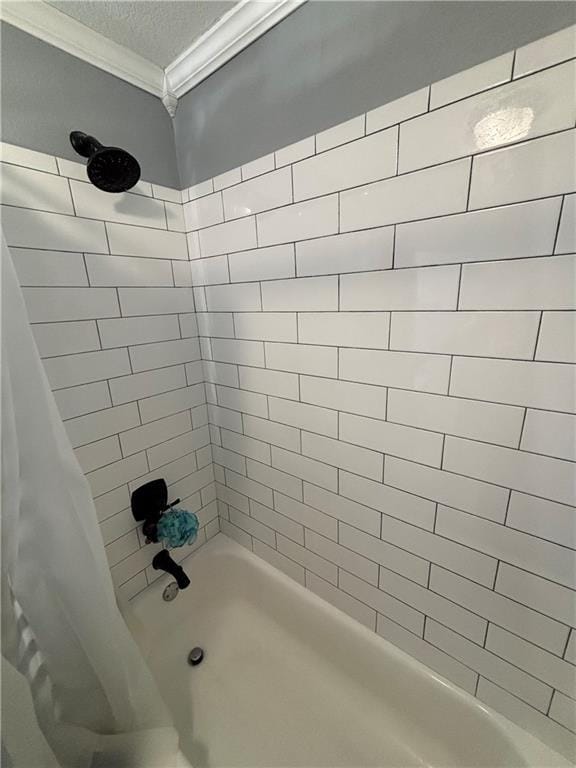 620 S Evergreen Ave, Chanute, KS 66720 - full bathroom featuring ornamental molding, shower / bath combination with curtain, and a textured ceiling