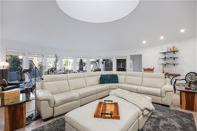 8201 W 100th Ter, Overland Park, KS 66212 - living area featuring healthy amount of natural light and recessed lighting