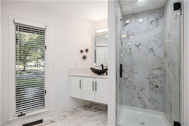 8201 W 100th Ter, Overland Park, KS 66212 - full bath featuring a marble finish shower, marble finish floors, vanity, and baseboards