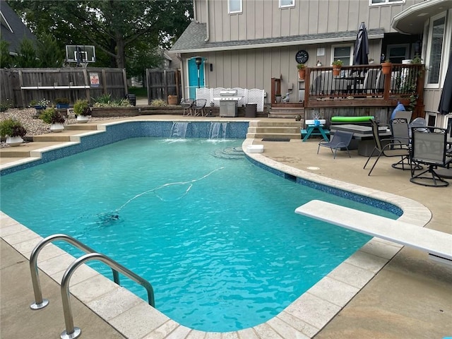8201 W 100th Ter, Overland Park, KS 66212 - view of pool featuring a deck, a diving board, and a patio area