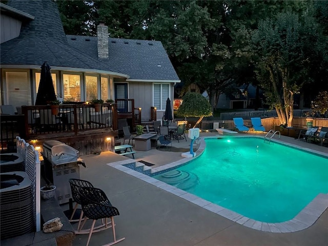 8201 W 100th Ter, Overland Park, KS 66212 - view of swimming pool with a patio area, a grill, and cooling unit