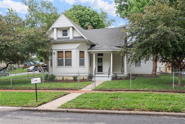 901 S 3rd St, Leavenworth, KS 66048 - bungalow-style home with covered porch, a shingled roof, and a chimney