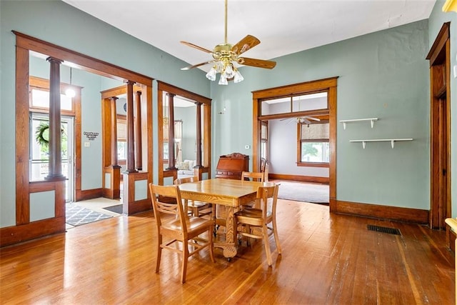 901 S 3rd St, Leavenworth, KS 66048 - dining space featuring wood-type flooring, ceiling fan, and baseboards